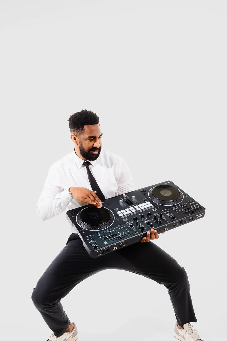 An Upchurch DJ performing with a keyboard controller.